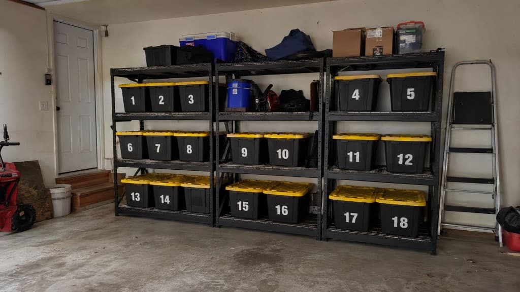 Organized holiday storage area with numbered totes and seasonal decor storage